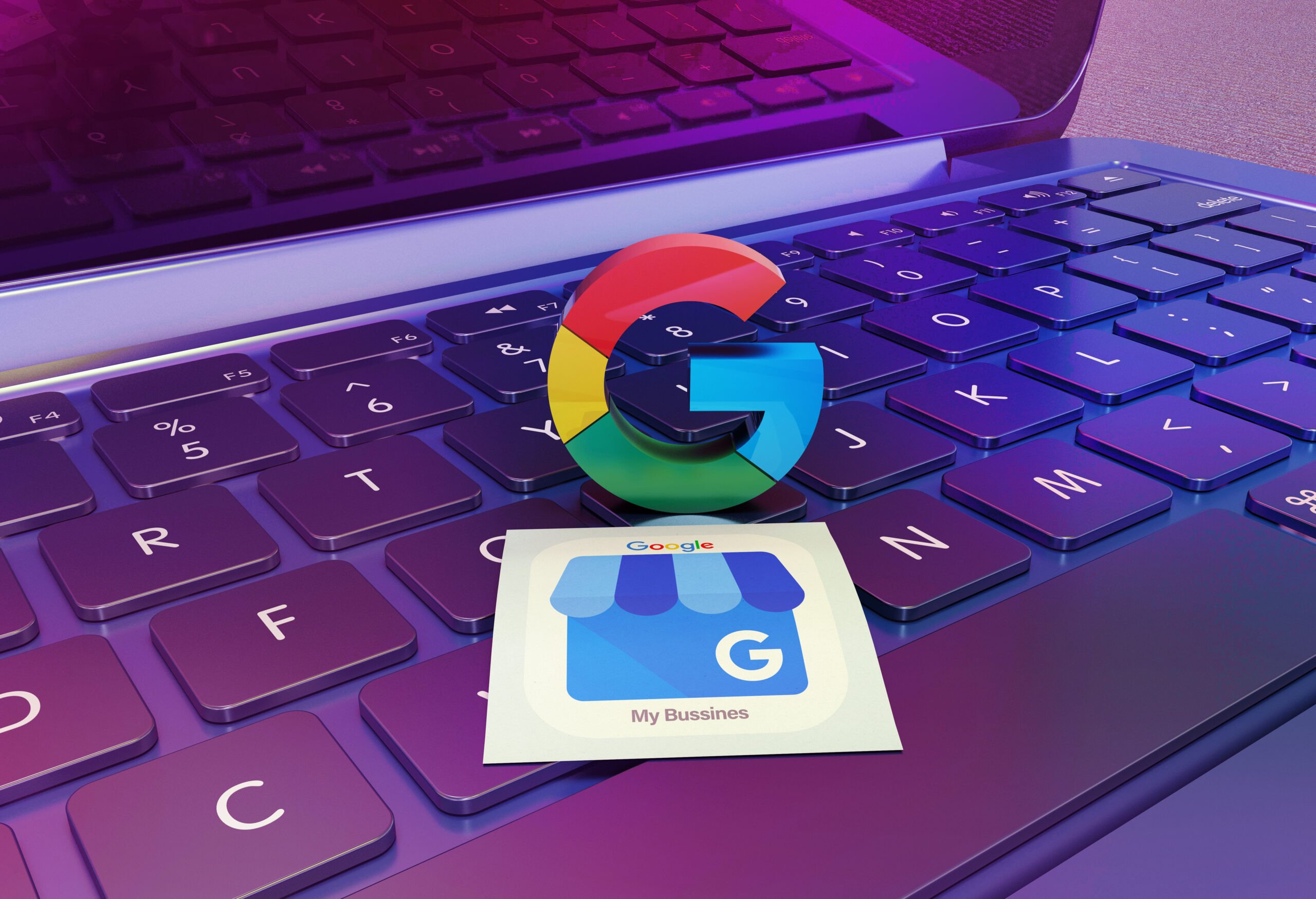 The Google Business Profile logo on a laptop keyboard